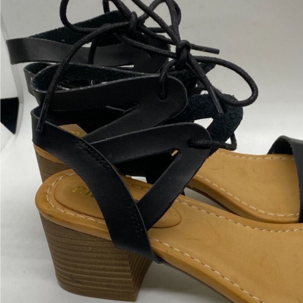 Black Heels with Intricate Lacing and Chunky Heel